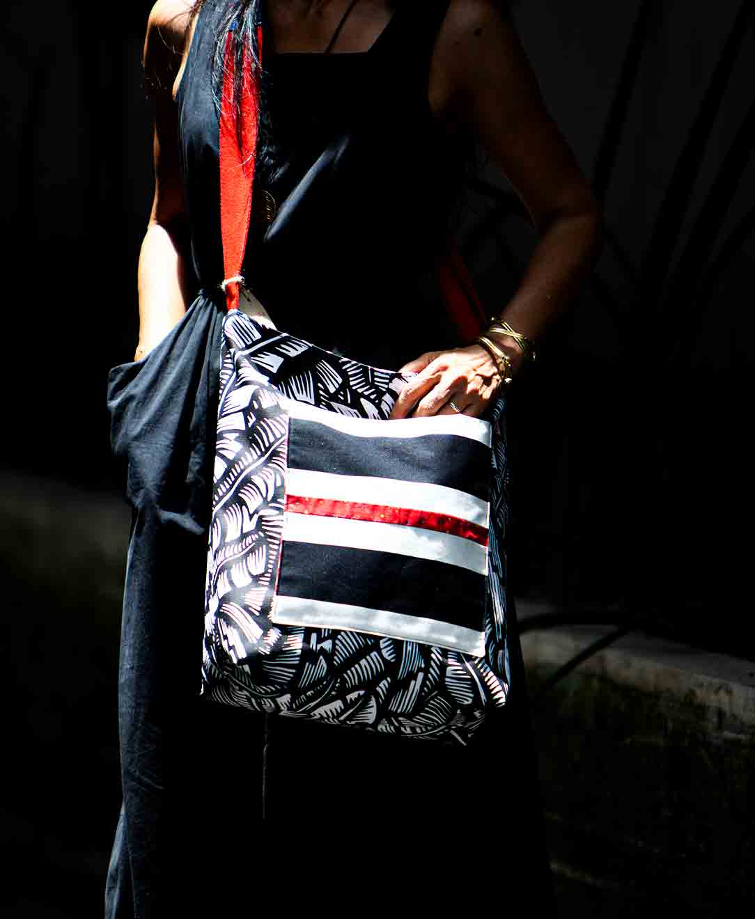 woman wearing a kanika handbag