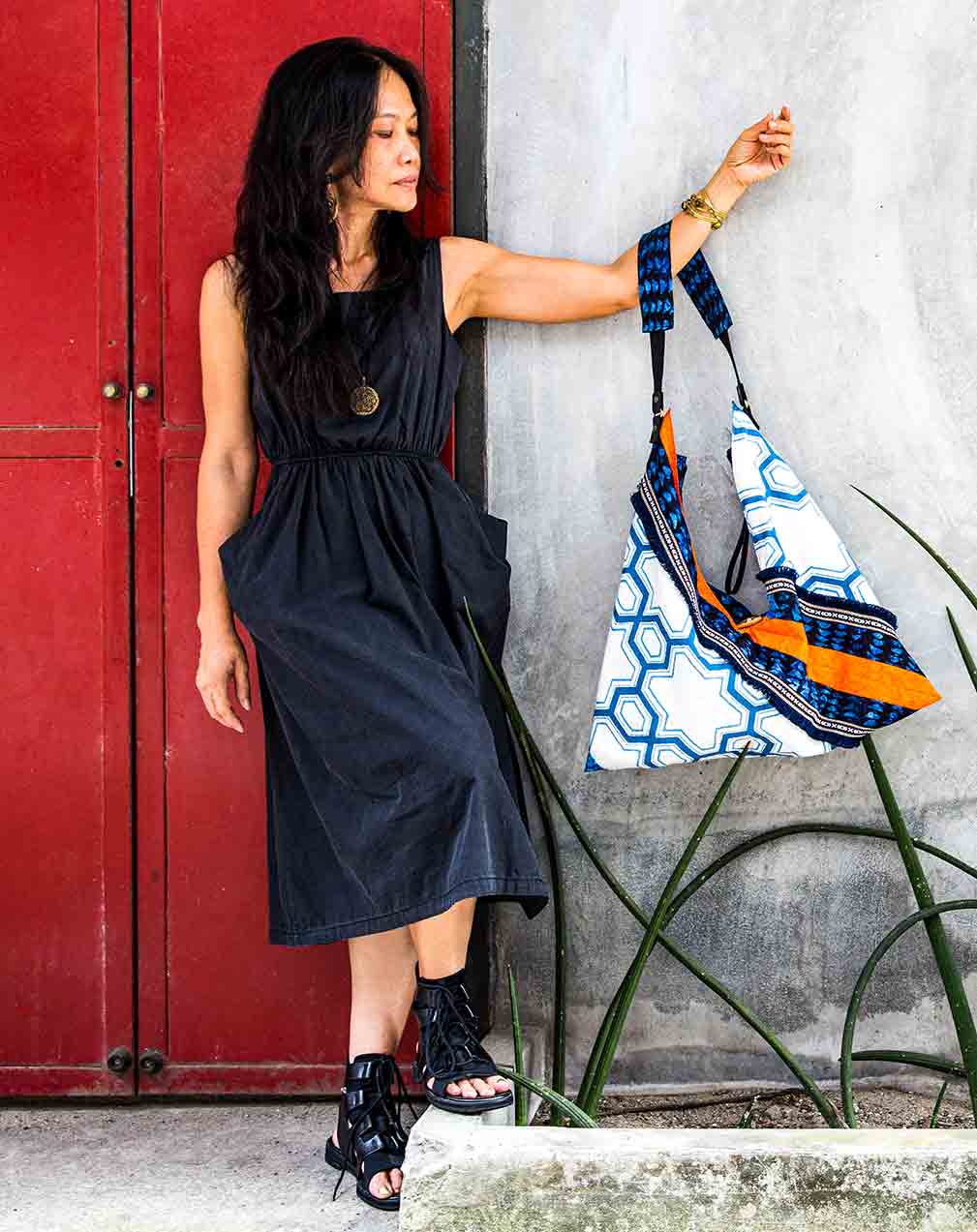 Kanika holding bag